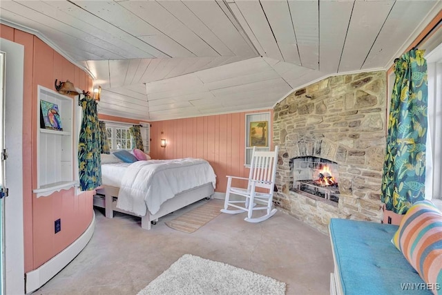 256 W Shore Rd, Cuba, NY 14727 - bedroom with wooden walls, wood ceiling, a fireplace, and lofted ceiling