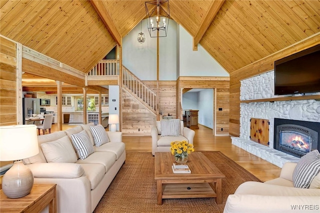 256 W Shore Rd, Cuba, NY 14727 - living area featuring wood walls, a chandelier, high vaulted ceiling, and wooden ceiling