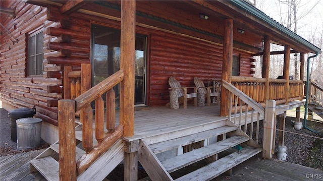 wooden deck featuring stairs