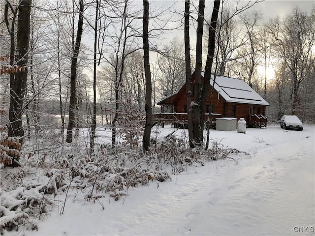 view of yard layered in snow