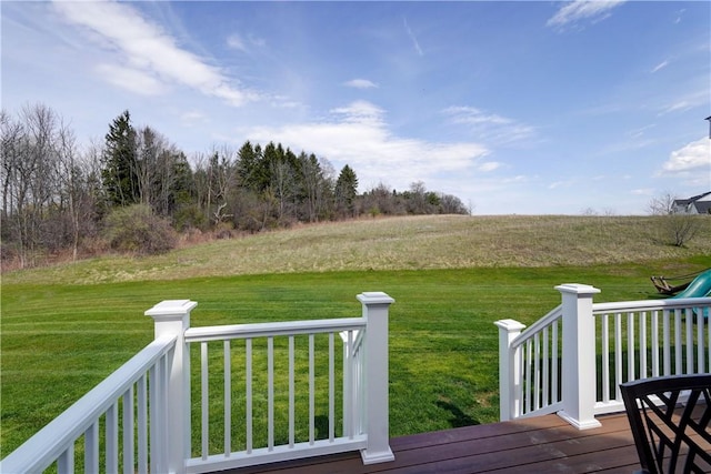 deck featuring a yard