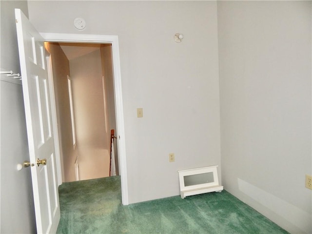 empty room featuring carpet floors