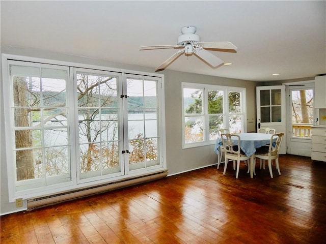 sunroom with french doors and baseboard heating