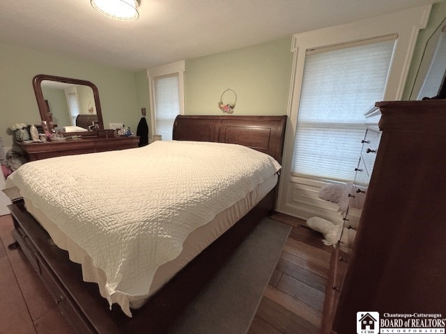 bedroom featuring wood-type flooring