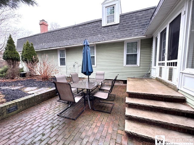 view of patio with outdoor dining area