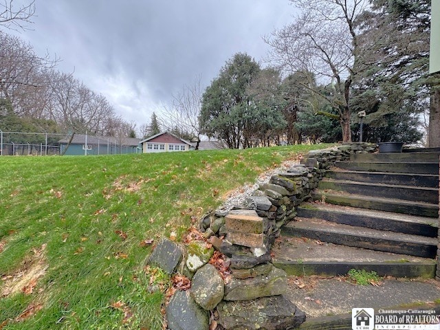 view of yard featuring fence