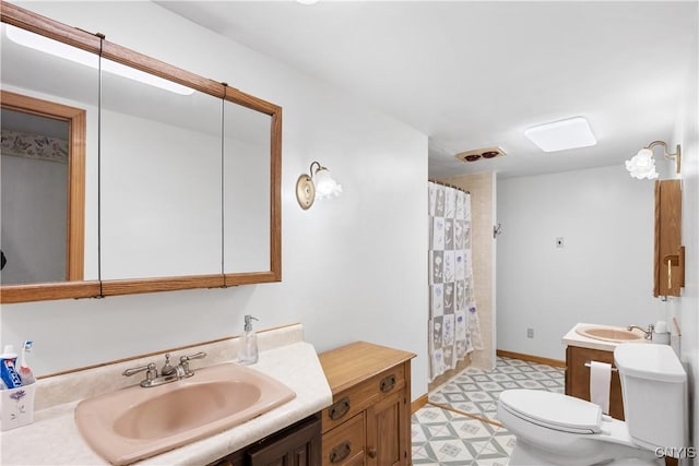 full bathroom featuring toilet, a shower with curtain, tile patterned floors, and vanity