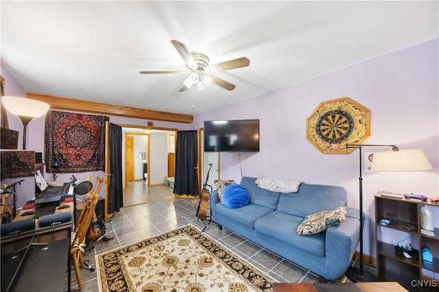 living room with tile patterned flooring and ceiling fan