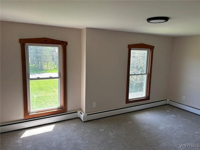 empty room featuring carpet and a wealth of natural light