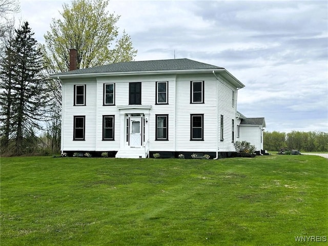 7310 Milestrip Rd, Orchard Park, NY 14127 - colonial home with a front lawn, a chimney, and entry steps