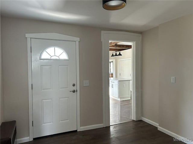 7310 Milestrip Rd, Orchard Park, NY 14127 - foyer entrance with baseboards and dark wood-type flooring