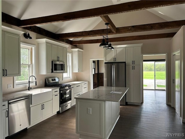 7310 Milestrip Rd, Orchard Park, NY 14127 - kitchen with appliances with stainless steel finishes, a sink, a kitchen island, beam ceiling, and dark wood-style floors