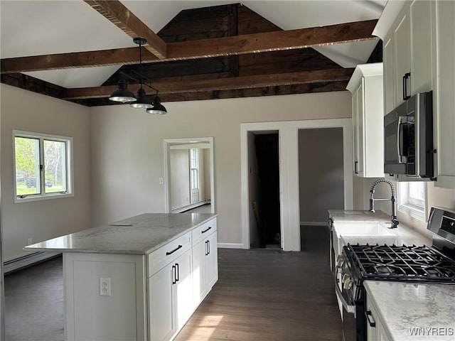 7310 Milestrip Rd, Orchard Park, NY 14127 - kitchen featuring a sink, stainless steel appliances, light stone counters, white cabinets, and a kitchen island