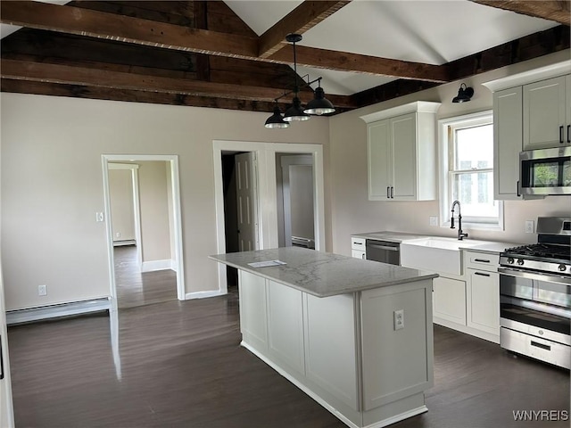 7310 Milestrip Rd, Orchard Park, NY 14127 - kitchen with a baseboard heating unit, a kitchen island, a sink, dark wood-type flooring, and stainless steel appliances