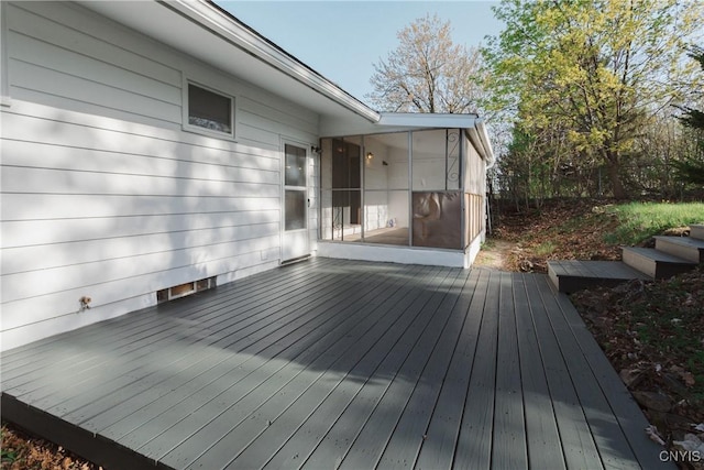 deck with a sunroom