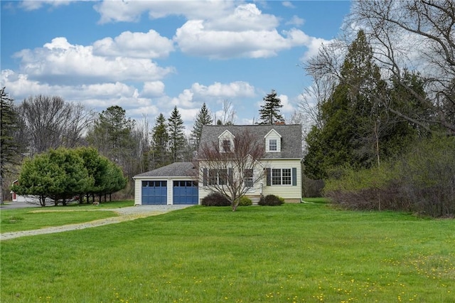 cape cod house with an attached garage, driveway, and a front lawn