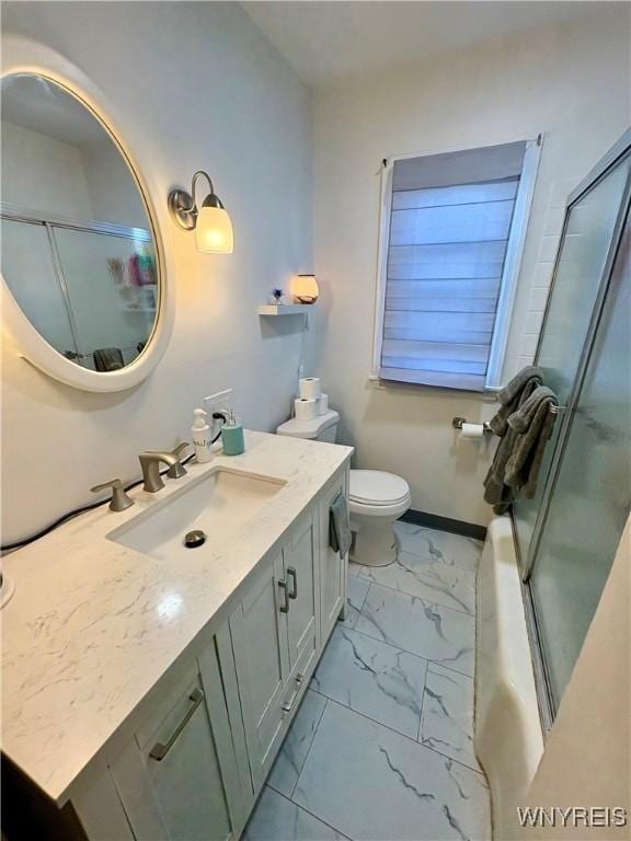 full bath with vanity, marble finish floor, baseboards, and toilet