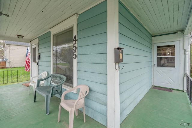 view of patio featuring a porch