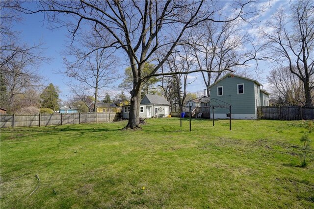 view of yard with a fenced backyard and a gazebo