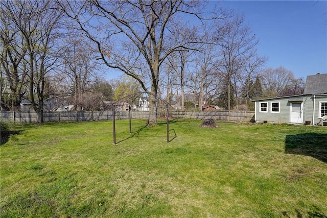view of yard with a fenced backyard