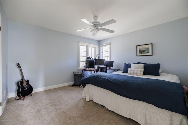 bedroom with baseboards, ceiling fan, and carpet
