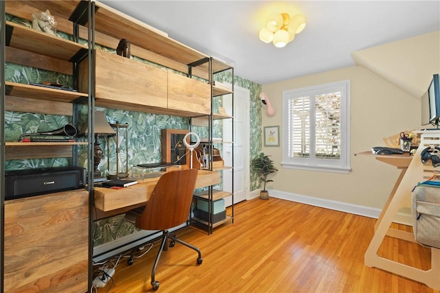 home office with baseboards and wood finished floors