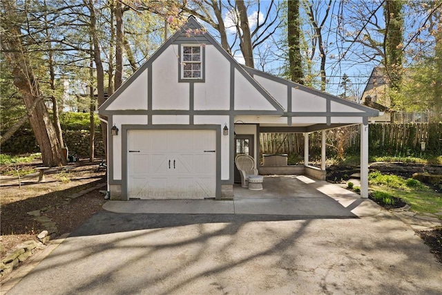 exterior space featuring aphalt driveway