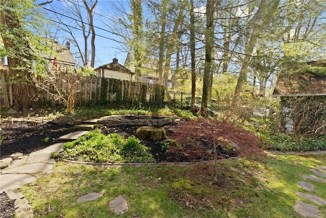 view of yard with fence