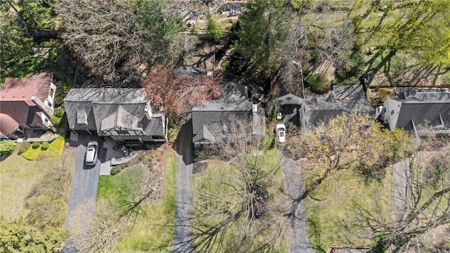 birds eye view of property with a residential view
