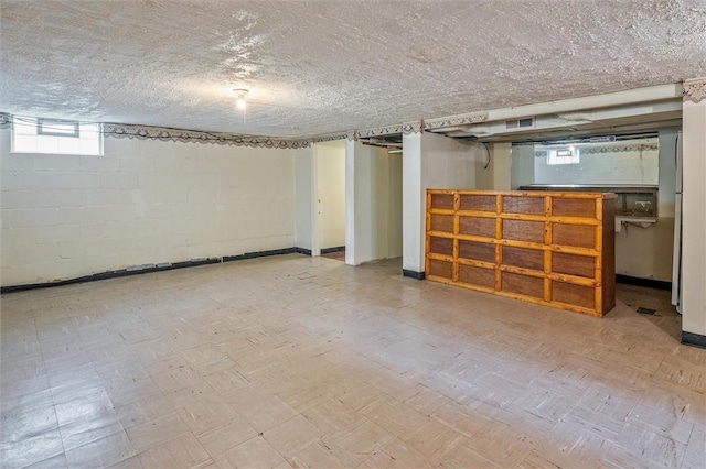 basement featuring concrete block wall