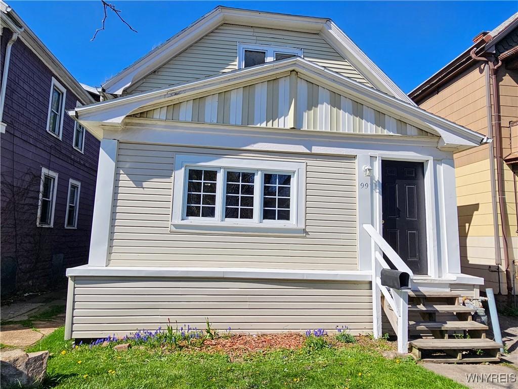 99 Custer St, Buffalo, NY 14214 - view of front facade with board and batten siding