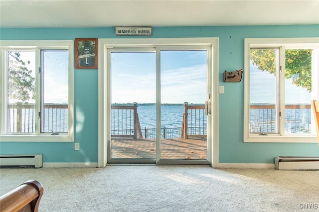 21959 County Route 59, Brownville, NY 13634 - entryway featuring a water view, a baseboard radiator, and carpet