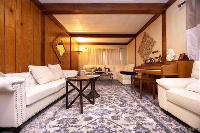 723 Pine Ave, Niagara Falls, NY 14301 - carpeted living area with wood walls and beam ceiling