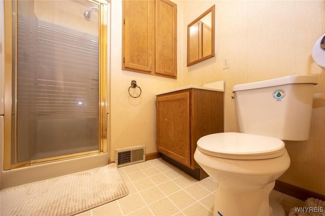 723 Pine Ave, Niagara Falls, NY 14301 - full bath featuring visible vents, a shower stall, vanity, baseboards, and toilet