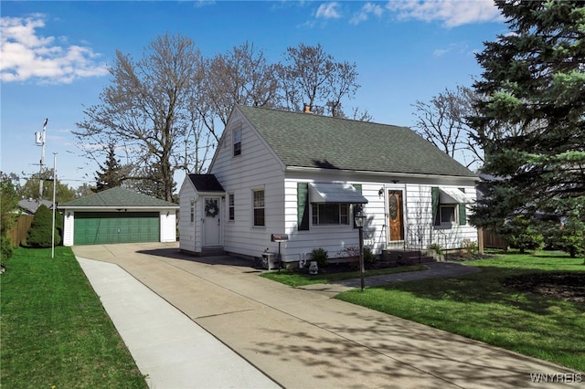 view of front of house featuring a front lawn, roof with shingles, an outbuilding, and entry steps