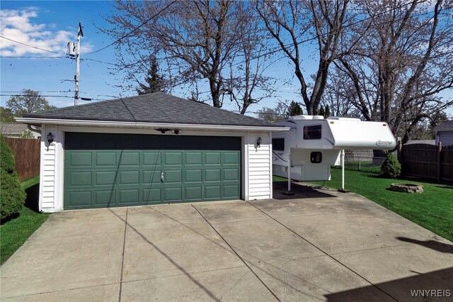 detached garage with fence