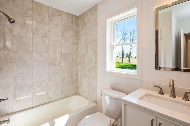 full bath with toilet, shower / tub combination, and vanity