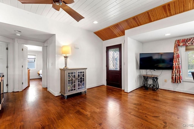 entryway with a ceiling fan, wood ceiling, and wood finished floors