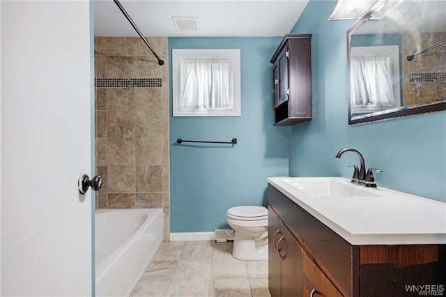 full bathroom with vanity, toilet, baseboards, tub / shower combination, and visible vents