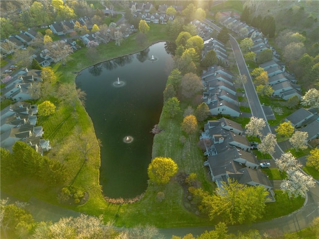 aerial view with a water view and a residential view