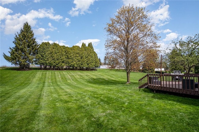 view of yard with a deck