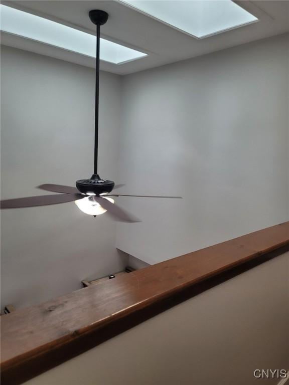 interior details featuring ceiling fan