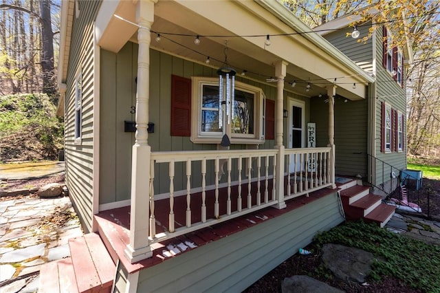 property entrance featuring covered porch