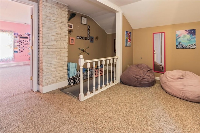 bonus room with vaulted ceiling, baseboards, and carpet flooring