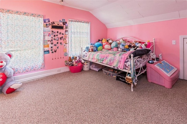 bedroom featuring carpet floors and vaulted ceiling