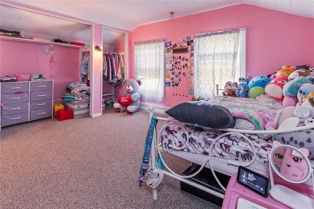 carpeted bedroom featuring lofted ceiling