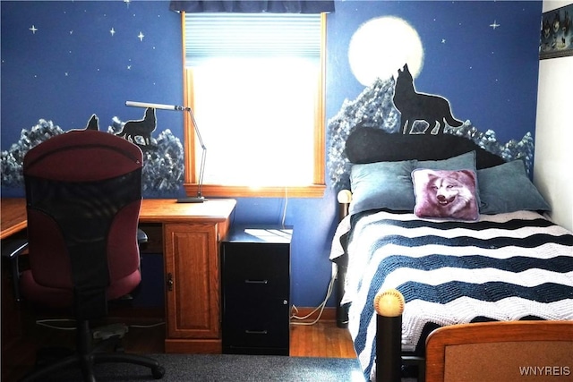 bedroom featuring wood finished floors