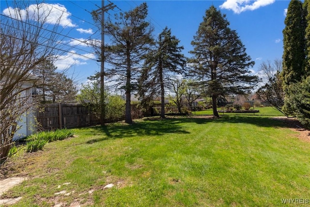 view of yard featuring fence