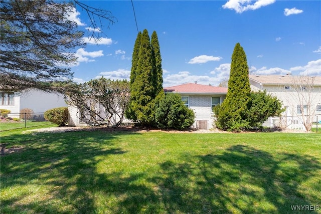 view of yard with fence
