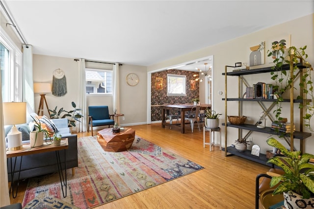 living room featuring baseboards and wood finished floors